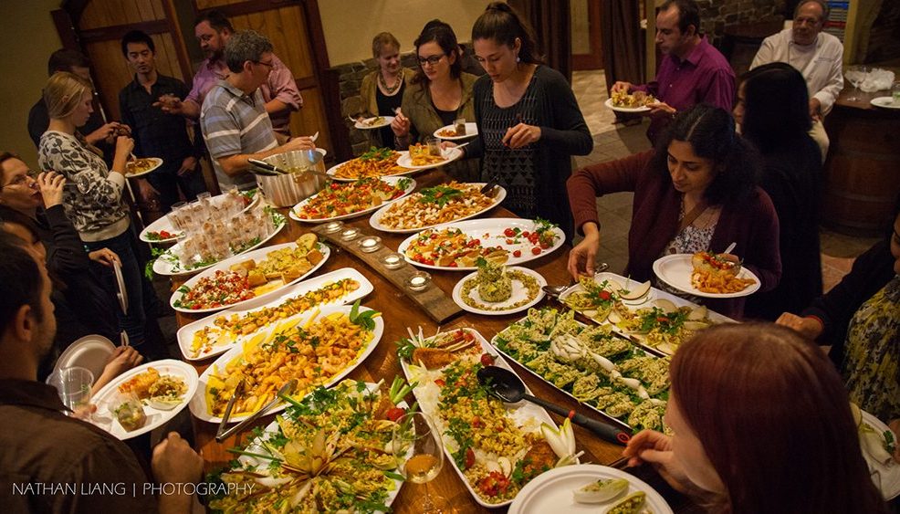 Employees Taking their wine while blindfolded
