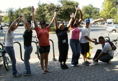 Team members celebrating during team building scavenger hunt