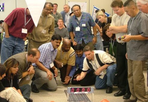 fast-paced team building car race