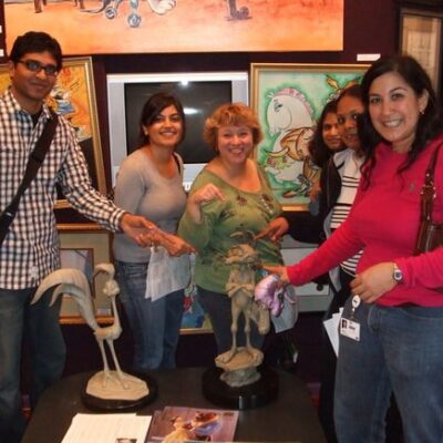 Employees surrounded by art thumbnail