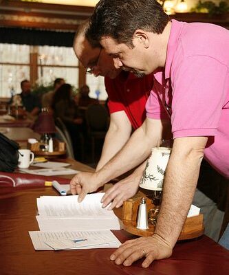 Employees analyzing program flows thumbnail