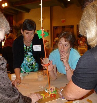 Employees participating in a game thumbnail