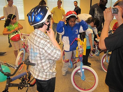 kids riding donated bikes
