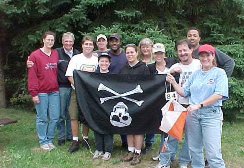 Employees pose for a picture during team building