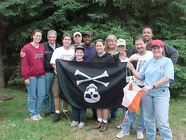 Employees pose for a picture during team building