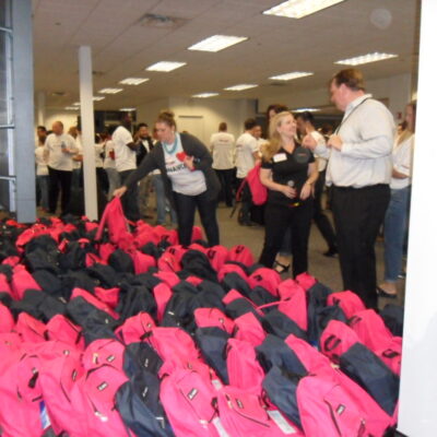 Employees ready for bags giveaway