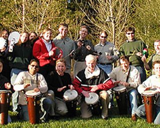 Group of people taking pictures with their instruments
