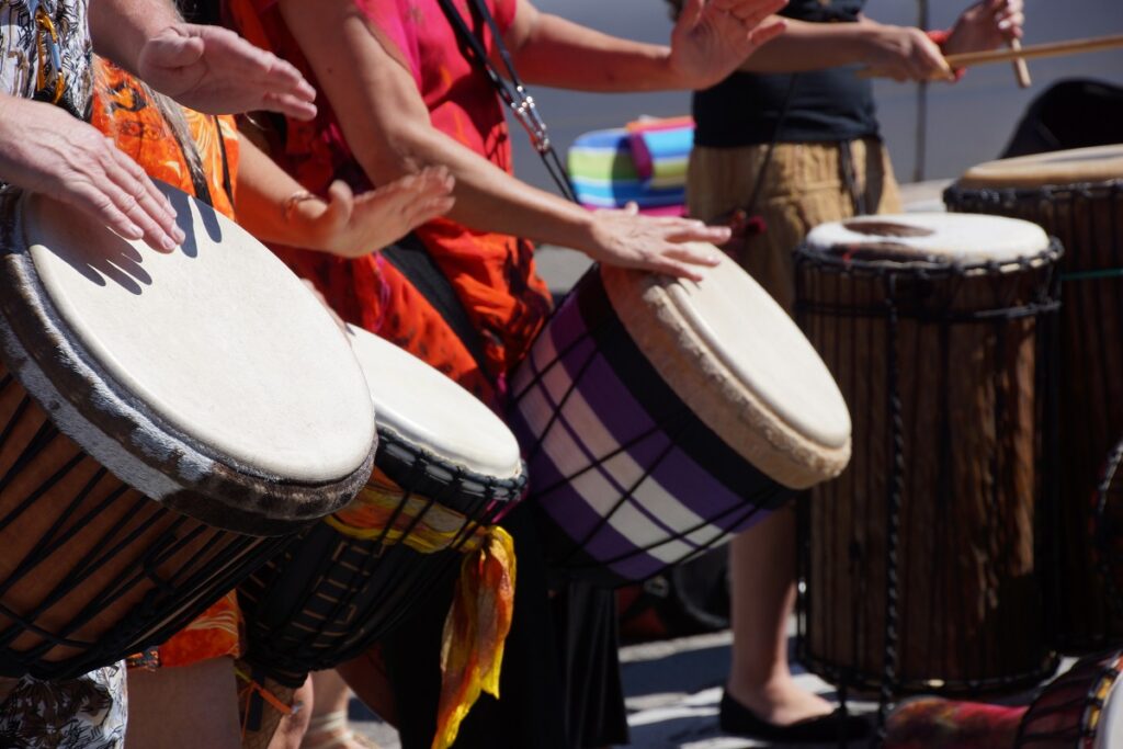 team drumming together