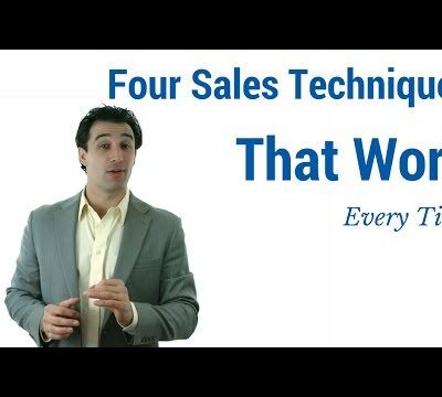 Image of the a manager explaining Four Sales Techniques That work Every time during a leaders meeting