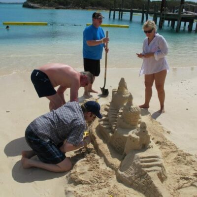 Employees make some sand castle