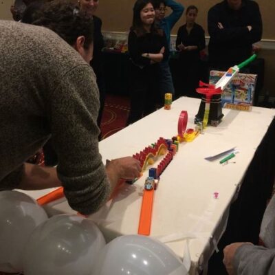 Featured Image For The Domino Effect Team Building Post