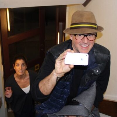 An employee having fun taking pictures at Scavenger Hunt Event by TeamBonding thumbnail