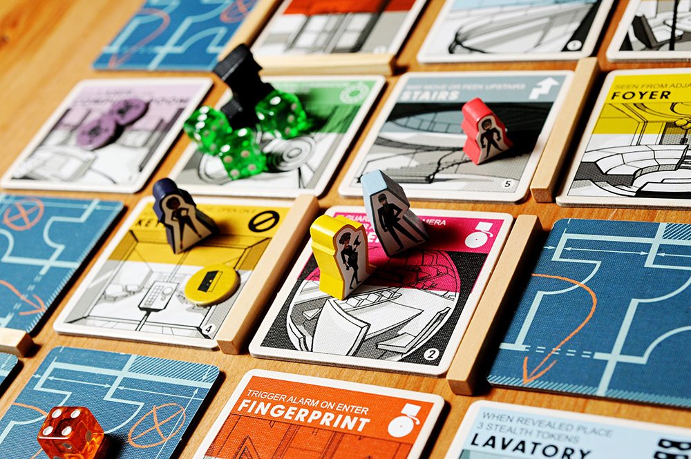Image of the cartoons and dice on the game board