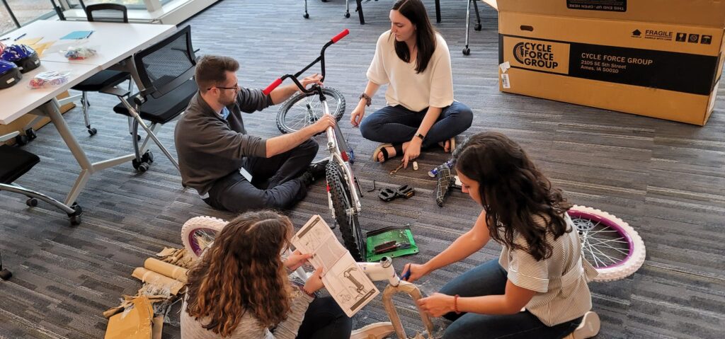 Team Building event in which teams assemble bicycles for charity.