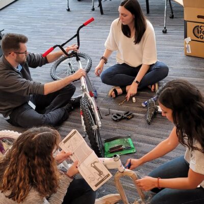 Team Building event in which teams assemble bicycles for charity.