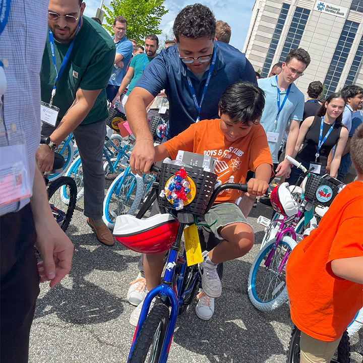 Companies build and donate bikes for charity.