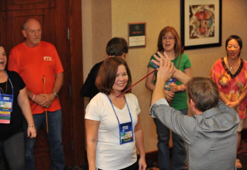 Employees participate in Arrow break contest by TeamBonding