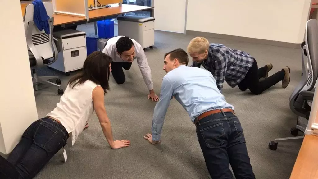 Employees doing push-ups