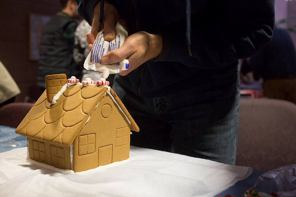 Decorating a gingerbread house