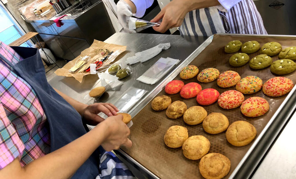 Decorating colorful cookies