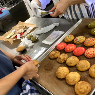 Decorating colorful cookies