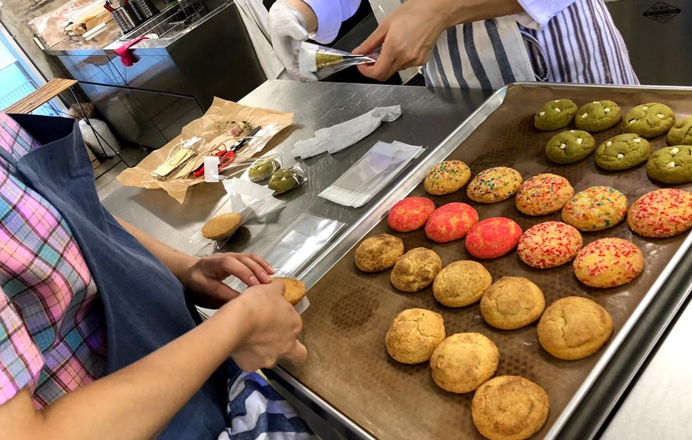 Decorating colorful cookies