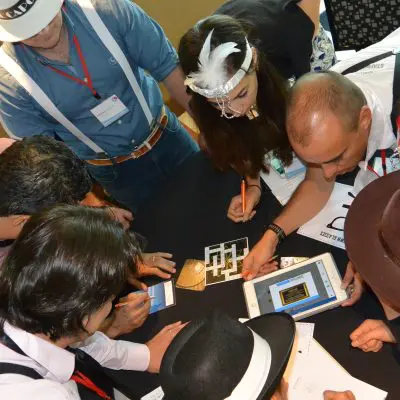 A team collaborates in the Escape the Mob event, solving puzzles and decoding clues to piece together an alibi and solve the mystery. thumbnail