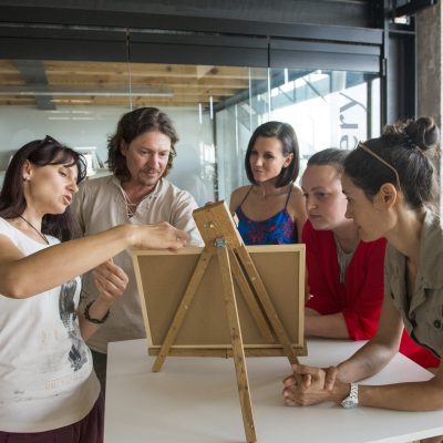 Team building activity focused on communication and collaboration. A group works together to reconstruct a model, emphasizing teamwork, strategy, and the importance of clear instructions. thumbnail