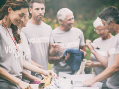 Featured Image For Employee Volunteering: 5 Mental Health Benefits of Helping Others Team Building Post