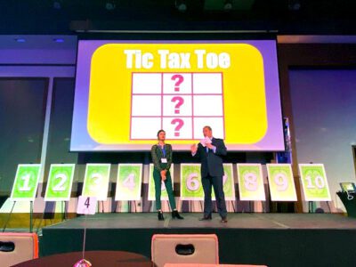 Featured Image For Play it Forward – The Giveback Game Show Team Building Event