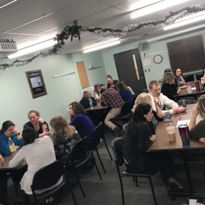 Teams participate in group discussions during a team building session, collaborating and exchanging ideas to strengthen workplace relationships. thumbnail